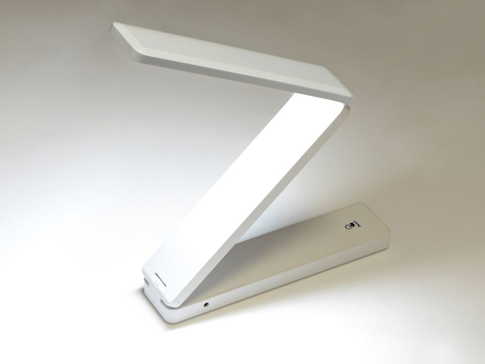 Складывающаяся настольная LED лампа Stack - фото от интернет-магазина подарков Хочу Дарю